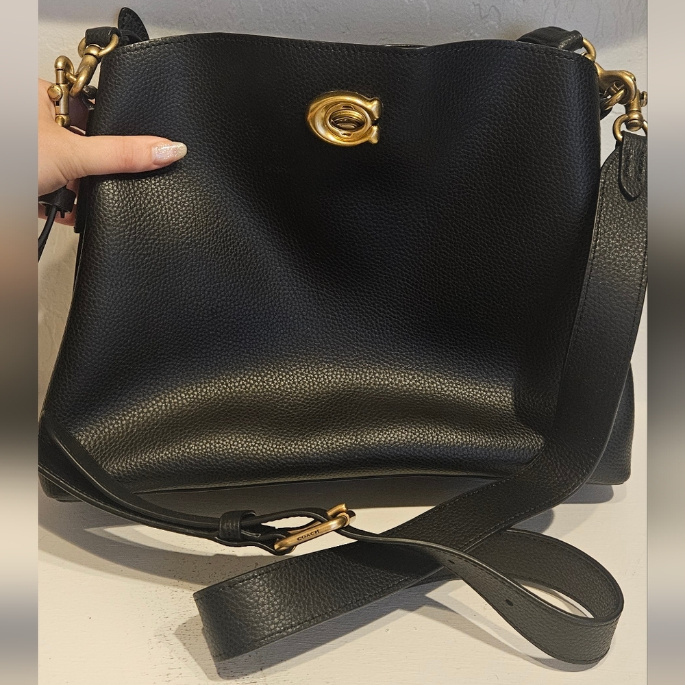 Coach Black Leather Shoulder Bag with Gold Accents